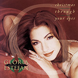 Download or print Gloria Estefan Christmas Through Your Eyes Sheet Music Printable PDF -page score for Latin / arranged Piano, Vocal & Guitar Chords (Right-Hand Melody) SKU: 473549.