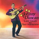 Download or print John Duncan Last Train To San Fernando Sheet Music Printable PDF -page score for Country / arranged Piano, Vocal & Guitar SKU: 111876.