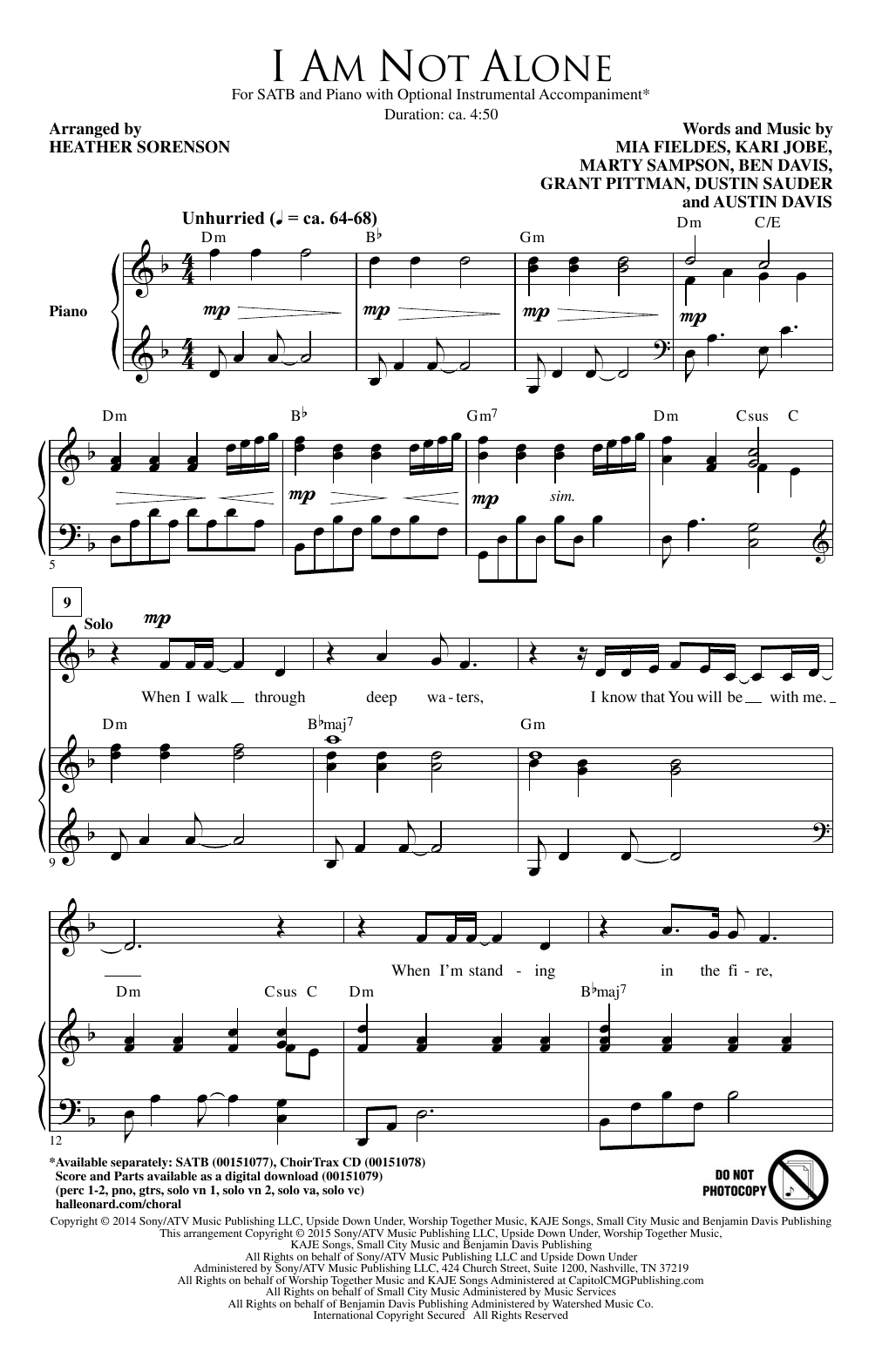 Download Kari Jobe I Am Not Alone (arr. Heather Sorenson) Sheet Music and learn how to play SATB PDF digital score in minutes
