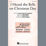 Download or print Nancy Grundahl I Heard The Bells On Christmas Day Sheet Music Printable PDF -page score for Concert / arranged SSA SKU: 95207.